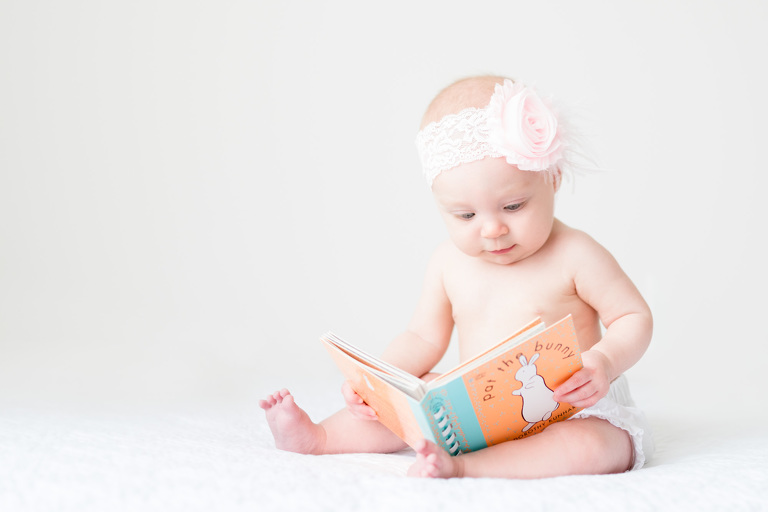 Best Oahu Baby Photographers Family Photographer Oahu | baby girl hold Pat the Bunny book